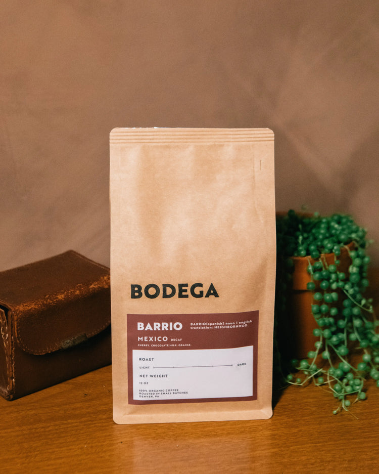 ASSUM house blend coffee bag by Bodega Coffee Roasters, featuring medium roast details and origin information from Brazil and Colombia.