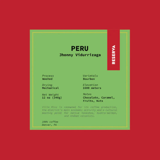 Sticker label on a bag of Peruvian coffee from Finca Vidurrizaga, showing details like Washed process, 1600 masl, and tasting notes of chocolate, caramel, fruit, and nut. - Bodega Coffee Roasters